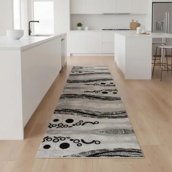 9' Gray And Black Geometric Runner Rug Photo 1