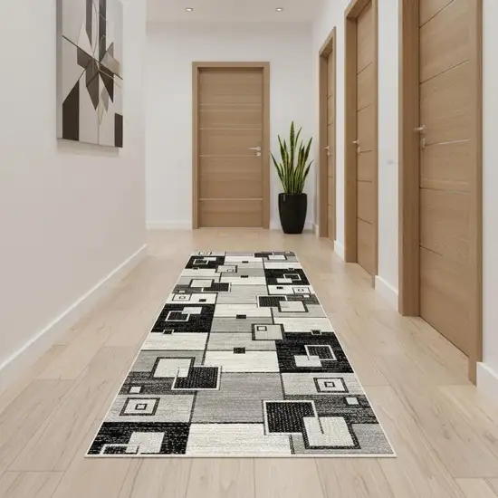 18' Gray And Black Geometric Runner Rug Photo 1