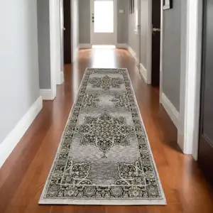 Photo of 8' Gray And Black Medallion Runner Rug With Fringe