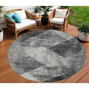 Photo of 8' Gray And Black Round Geometric Washable Indoor Outdoor Area Rug