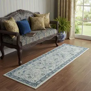 Photo of 6' Gray And Blue Floral Runner Rug