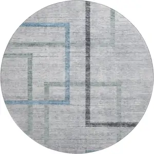 Photo of 8' Gray And Blue Geometric Washable Round Rug With UV Protection