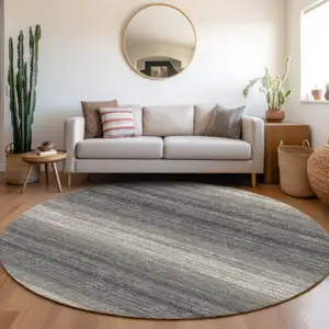 Photo of 8' Gray And Charcoal Round Striped Washable Indoor Outdoor Area Rug