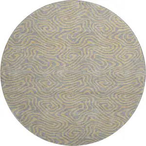 Photo of 8' Gray And Gold Abstract Washable Round Rug With UV Protection