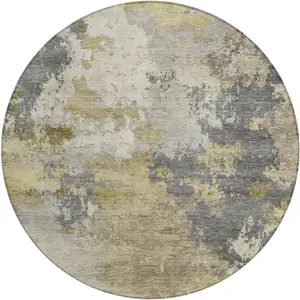 Photo of 8' Gray And Gold Round Abstract Washable Indoor Outdoor Area Rug