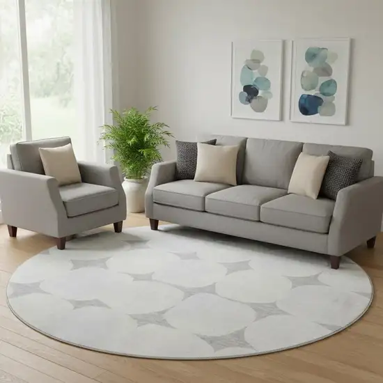 8' Gray And Ivory Abstract Geometric Washable Round Rug With UV Protection Photo 1
