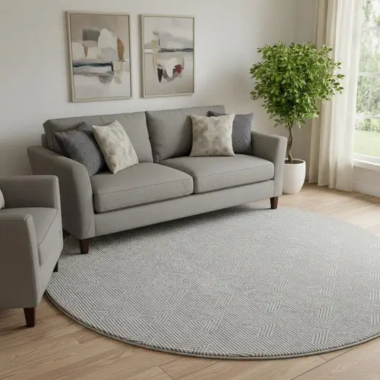 8' Gray And Ivory Abstract Geometric Washable Round Rug With UV Protection Photo 1