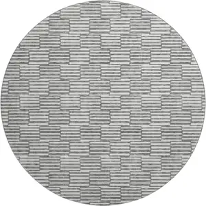Photo of 8' Gray And Ivory Abstract Geometric Washable Round Rug With UV Protection