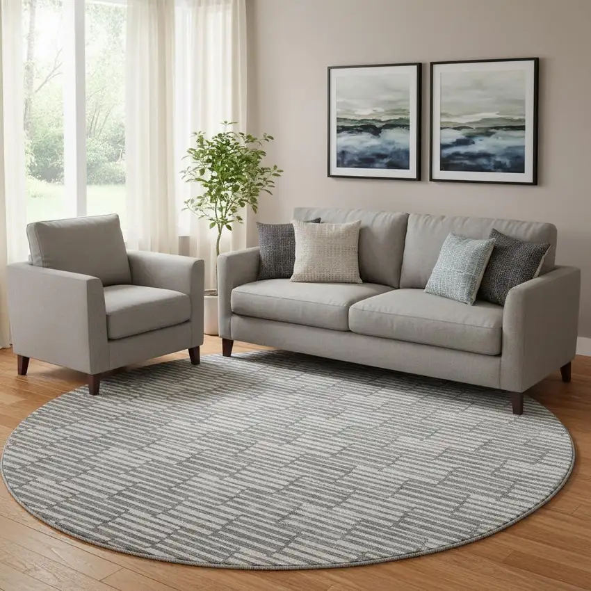 8' Gray And Ivory Abstract Geometric Washable Round Rug With UV Protection Photo 1