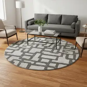 Photo of 8' Gray And Ivory Abstract Washable Round Rug With UV Protection