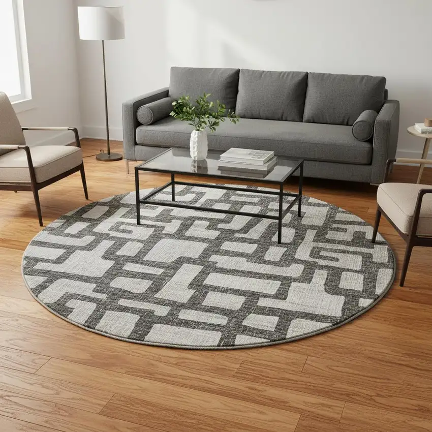 8' Gray And Ivory Abstract Washable Round Rug With UV Protection Photo 1