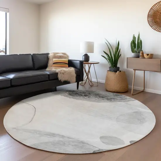 8' Gray And Ivory Abstract Washable Round Rug With UV Protection Photo 4