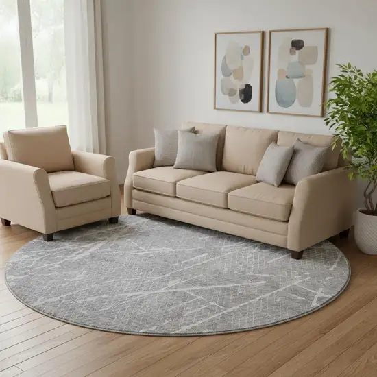 8' Gray And Ivory Abstract Washable Round Rug With UV Protection Photo 1