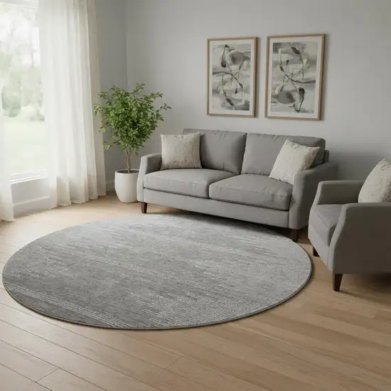 8' Gray And Ivory Abstract Washable Round Rug With UV Protection Photo 1