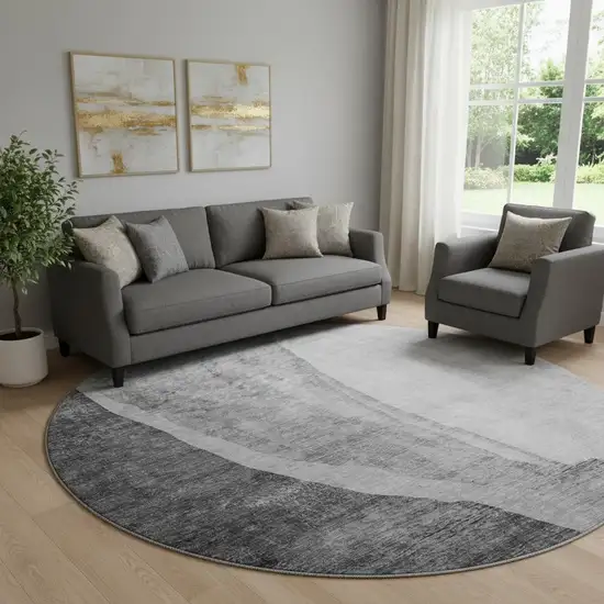 8' Gray And Ivory Abstract Washable Round Rug With UV Protection Photo 1
