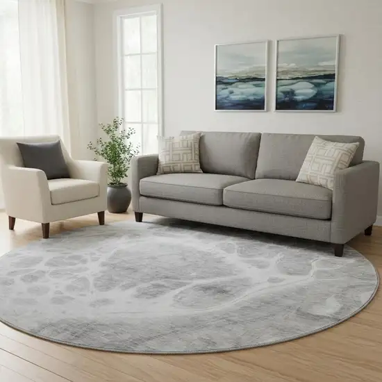 8' Gray And Ivory Abstract Washable Round Rug With UV Protection Photo 1