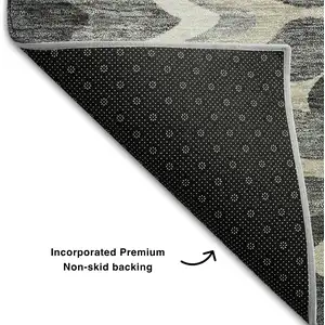 Photo of 8' Gray And Ivory Abstract Washable Round Rug With UV Protection