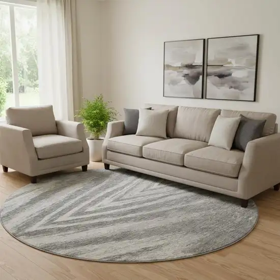 8' Gray And Ivory Abstract Washable Round Rug With UV Protection Photo 1