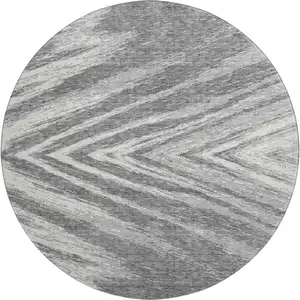 Photo of 8' Gray And Ivory Abstract Washable Round Rug With UV Protection