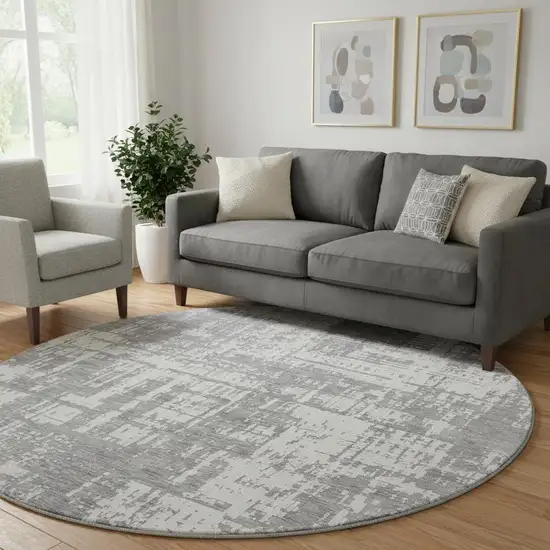 8' Gray And Ivory Abstract Washable Round Rug With UV Protection Photo 1
