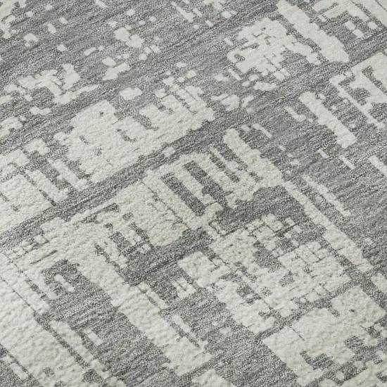 8' Gray And Ivory Abstract Washable Round Rug With UV Protection Photo 8