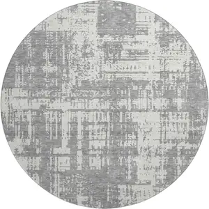 Photo of 8' Gray And Ivory Abstract Washable Round Rug With UV Protection