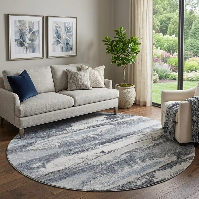 8' Gray And Ivory Abstract Washable Round Rug With UV Protection Photo 1
