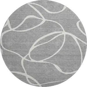 Photo of 8' Gray And Ivory Abstract Washable Round Rug With UV Protection