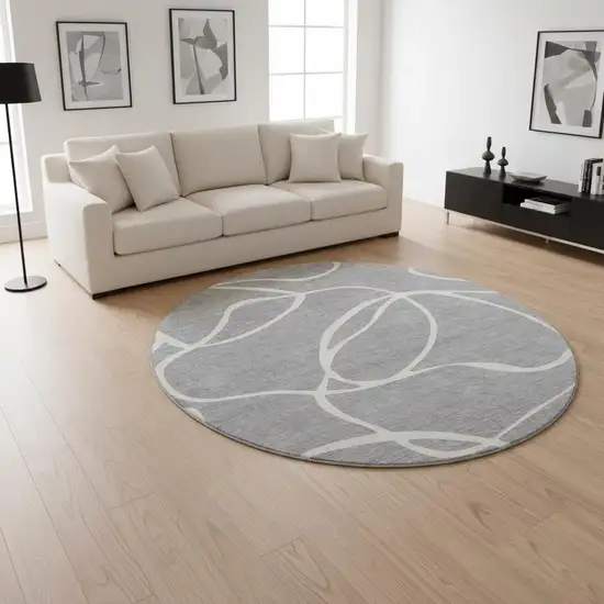 8' Gray And Ivory Abstract Washable Round Rug With UV Protection Photo 2