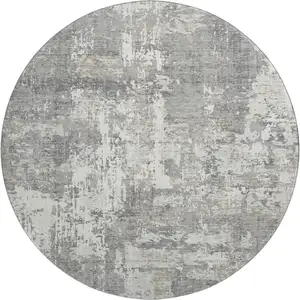 Photo of 8' Gray And Ivory Abstract Washable Round Rug With UV Protection