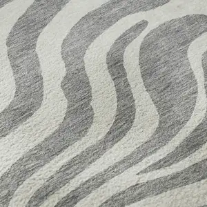 Photo of 8' Gray And Ivory Animal Print Washable Round Rug With UV Protection