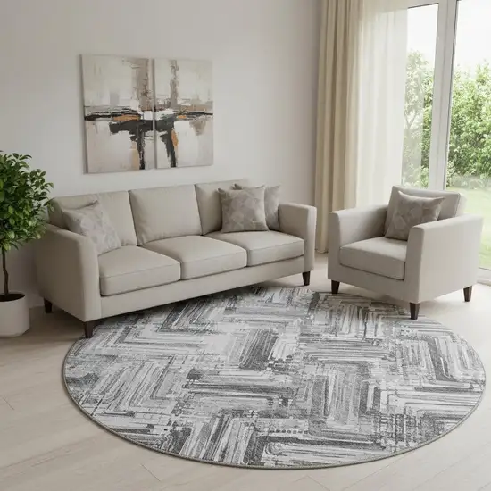 8' Gray And Ivory Chevron Washable Round Rug With UV Protection Photo 1