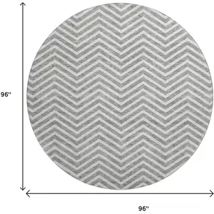 Photo of 8' Gray And Ivory Chevron Washable Round Rug With UV Protection