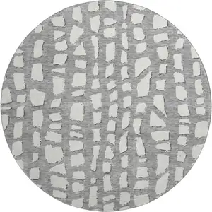 Photo of 8' Gray And Ivory Cobblestone Washable Round Rug With UV Protection