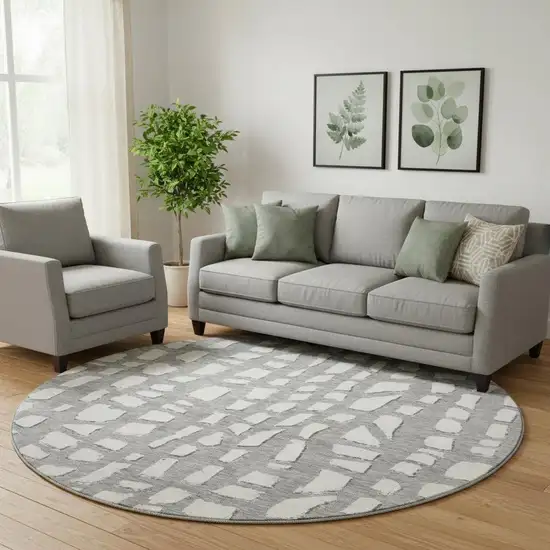 8' Gray And Ivory Cobblestone Washable Round Rug With UV Protection Photo 1