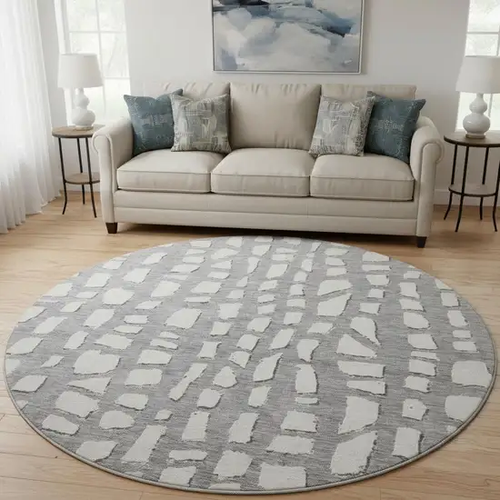 8' Gray And Ivory Cobblestone Washable Round Rug With UV Protection Photo 2