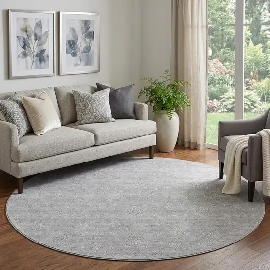 8' Gray And Ivory Floral Washable Round Rug With UV Protection Photo 1
