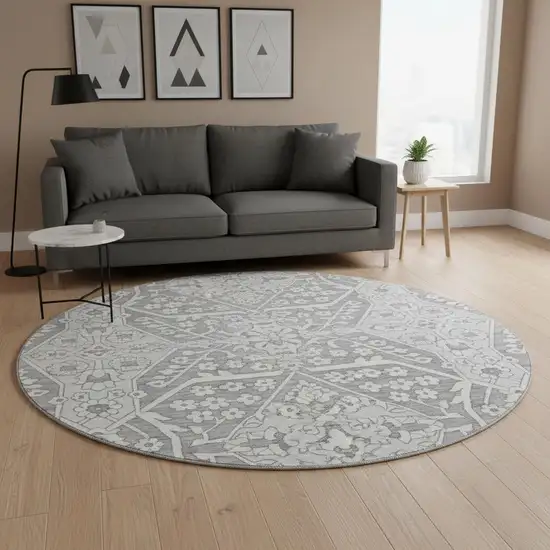 8' Gray And Ivory Floral Washable Round Rug With UV Protection Photo 1