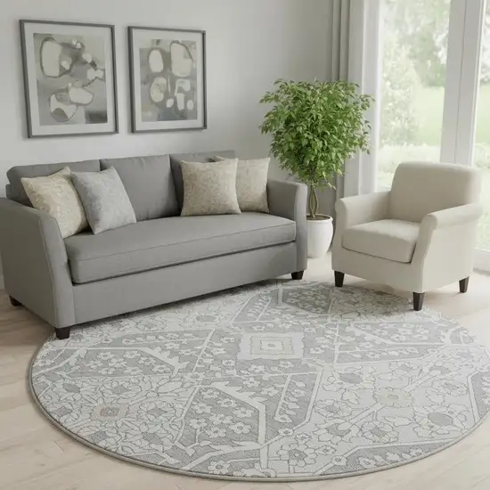 8' Gray And Ivory Floral Washable Round Rug With UV Protection Photo 1