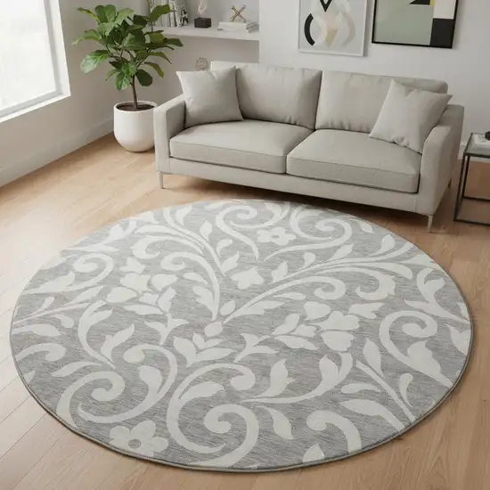 8' Gray And Ivory Floral Washable Round Rug With UV Protection Photo 2