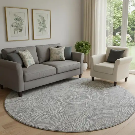8' Gray And Ivory Floral Washable Round Rug With UV Protection Photo 1