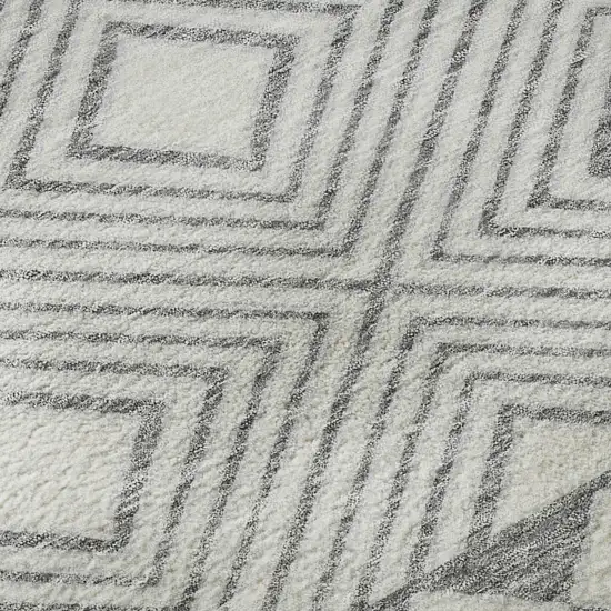 8' Gray And Ivory Geometric Washable Round Rug With UV Protection Photo 9