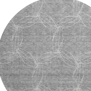 Photo of 8' Gray And Ivory Geometric Washable Round Rug With UV Protection