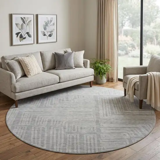 8' Gray And Ivory Geometric Washable Round Rug With UV Protection Photo 1