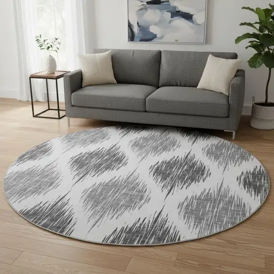 8' Gray And Ivory Ikat Washable Round Rug With UV Protection Photo 2