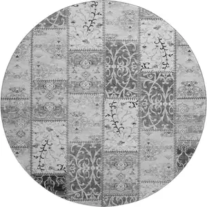 Photo of 8' Gray And Ivory Patchwork Washable Round Rug With UV Protection