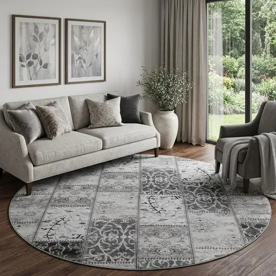 8' Gray And Ivory Patchwork Distressed Washable Round Rug With UV Protection Photo 1
