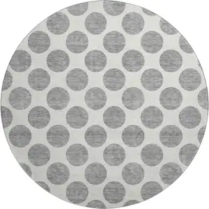 Photo of 8' Gray And Ivory Polka Dot Washable Round Rug With UV Protection