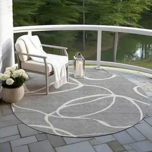 Photo of 8' Gray And Ivory Round Abstract Washable Indoor Outdoor Area Rug