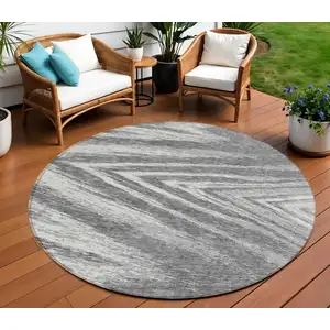 Photo of 8' Gray And Ivory Round Abstract Washable Indoor Outdoor Area Rug